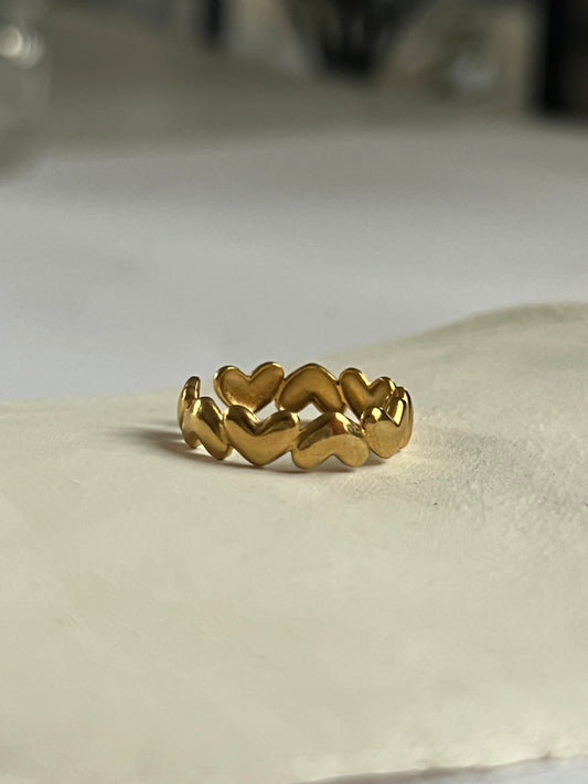 Reyna de corazones dorado